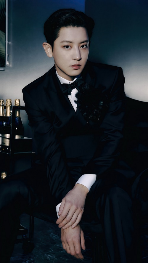 Chanyeol in a black tuxedo with a bow tie