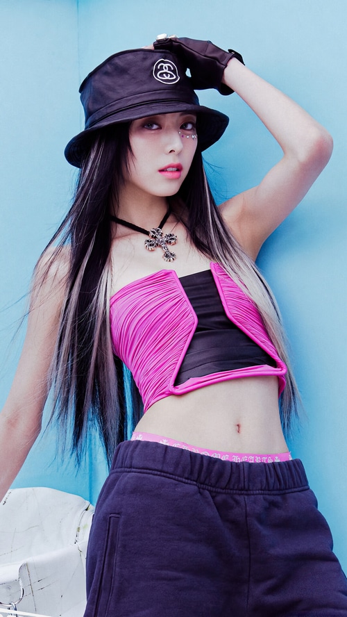 Shin Yu Na in a pink and black tube top and sweatpants