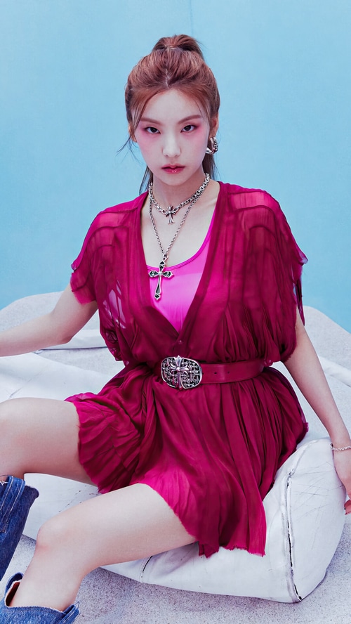 Yeji from ITZY in a pink top and magenta dress