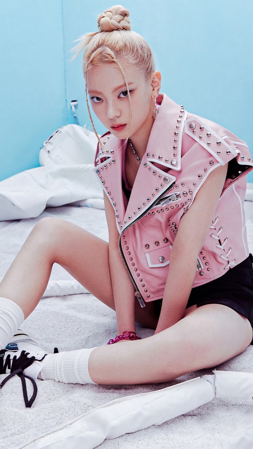 Lia from ITZY in a pink studded vest
