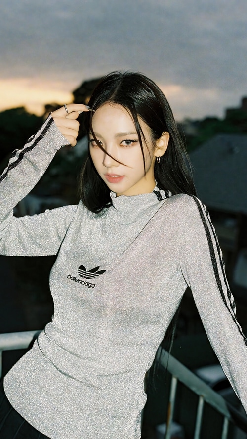 Karina from Aespa wearing a sparkly Adidas x Balenciaga top