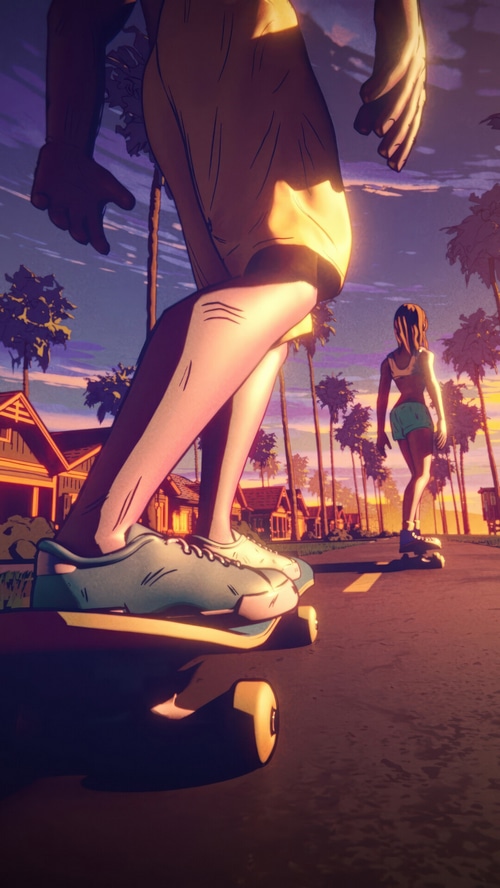 Two people skateboarding at sunset