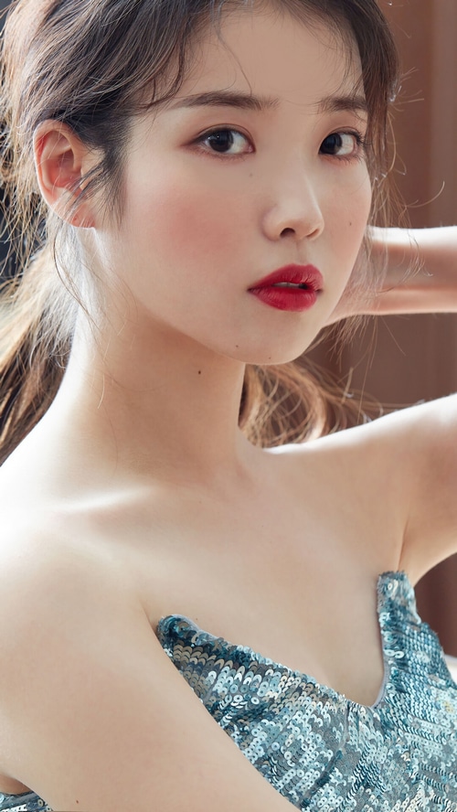 IU Lee Ji-eun in a sparkly blue dress