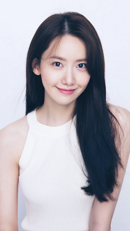 Yoona (Im Yoon Ah) smiling in a white top