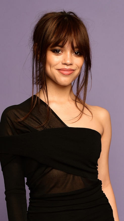 Jenna Ortega in a black one-shoulder dress