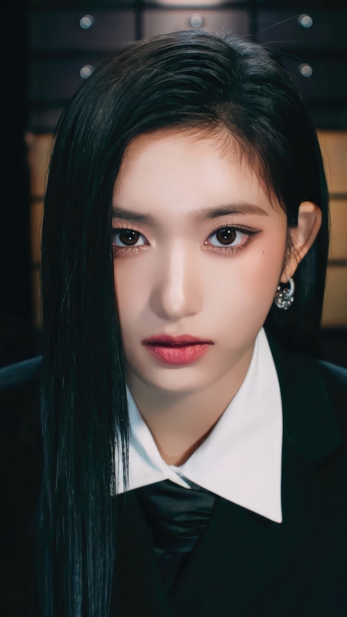 Leeseo from IVE in a black suit