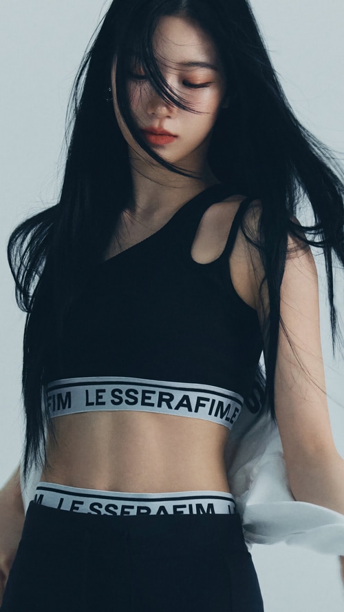 Kazuha of LE SSERAFIM in black athletic wear