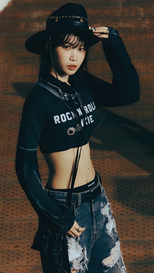 Kim Chae-won in a cowboy hat and ripped jeans