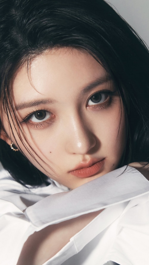 Gaeul from IVE posing in a white shirt