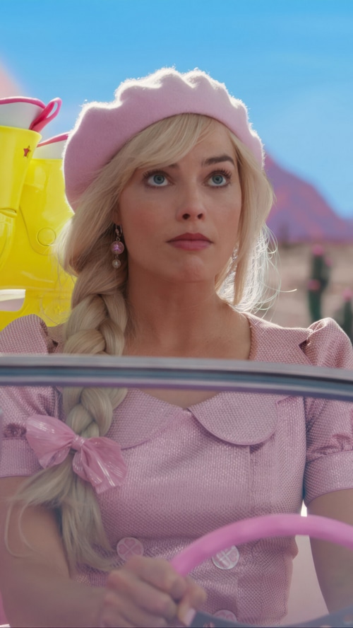 Margot Robbie as Barbie in a pink outfit