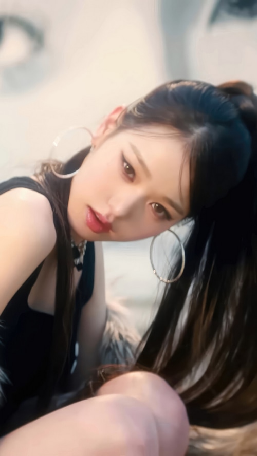 Jang Won-young of IVE with large hoop earrings