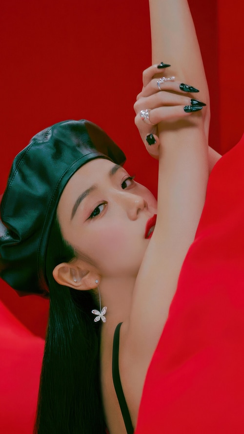 Jisoo wearing a black beret and red outfit