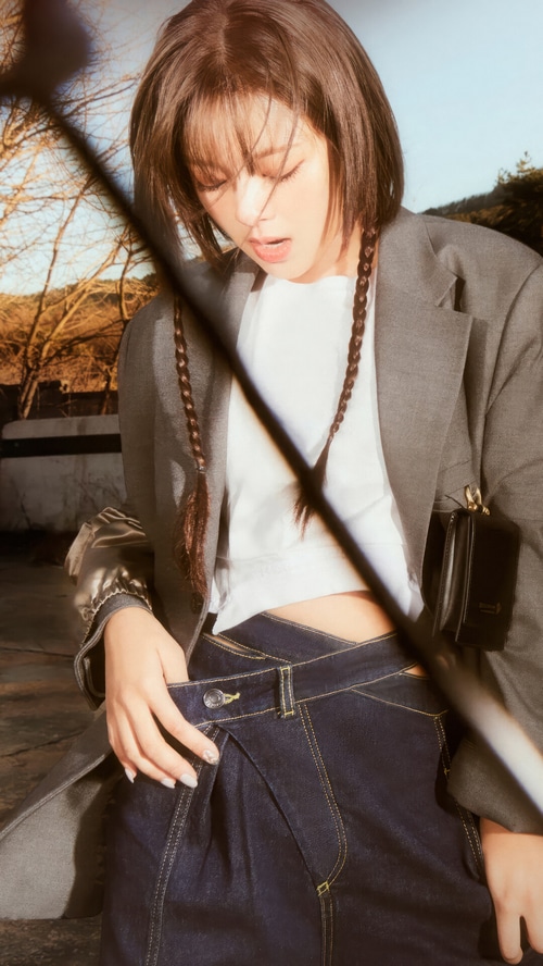 Jeongyeon from TWICE in a grey blazer and denim