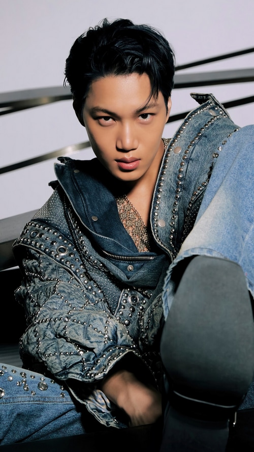 Kai in a studded denim jacket