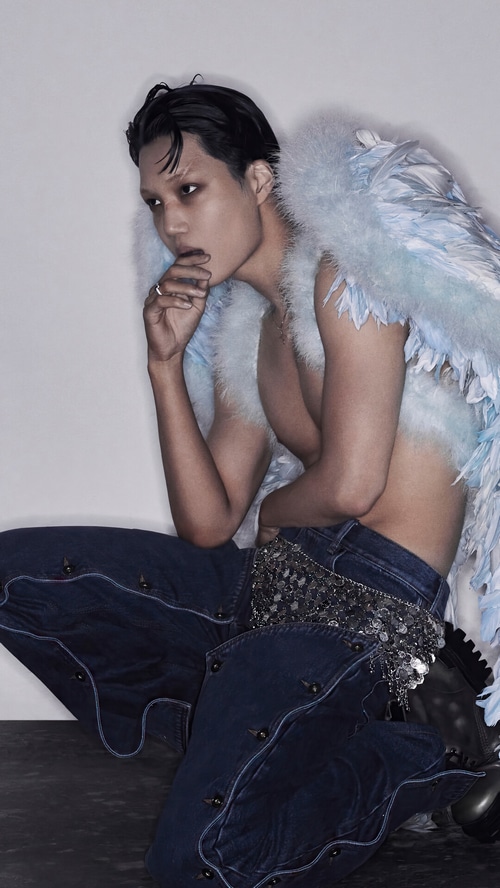 Kai in blue feathers and denim