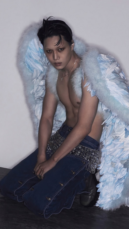 Kai in blue feathers and denim