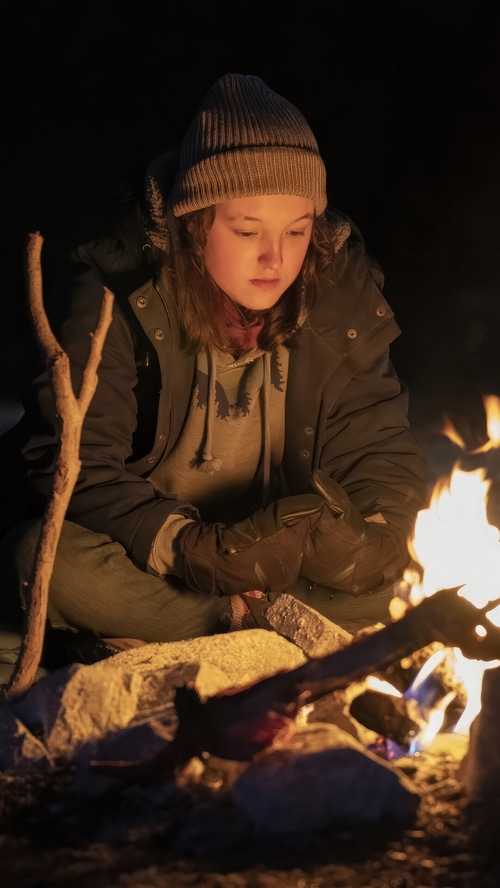 Ellie from The Last of Us Series by a campfire