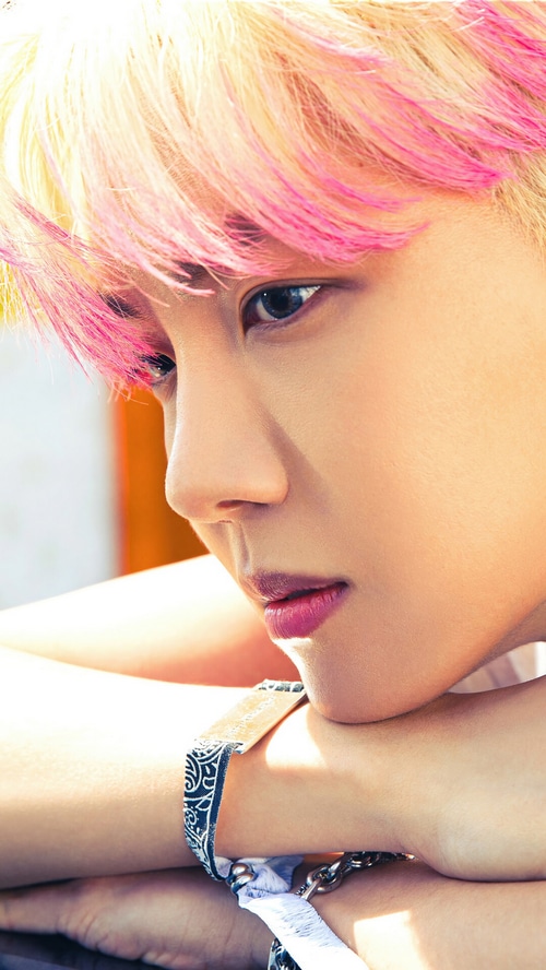 J-Hope of BTS with pink and blonde hair