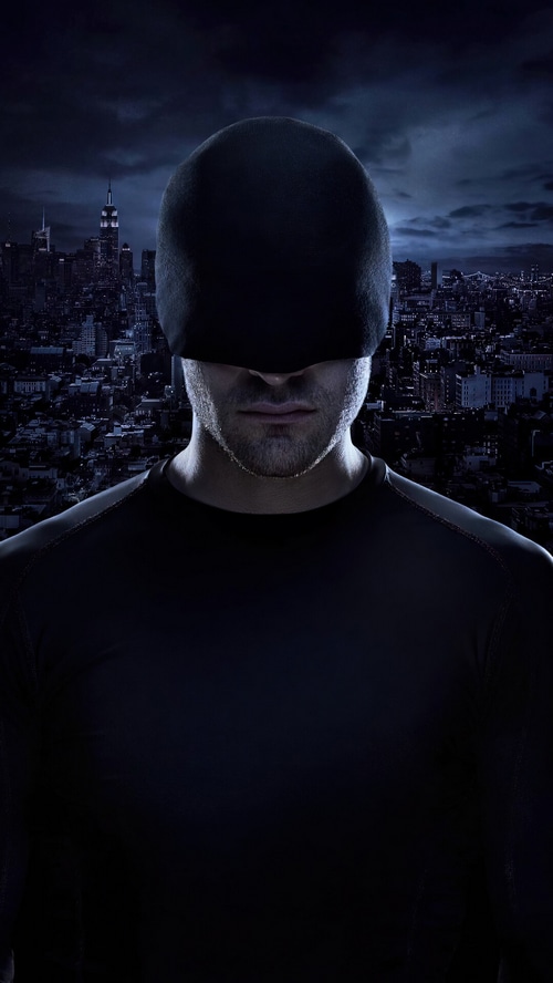 Daredevil in his first costume overlooking a city