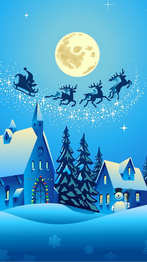 Santa Claus flying in a sleigh over a snowy village at night