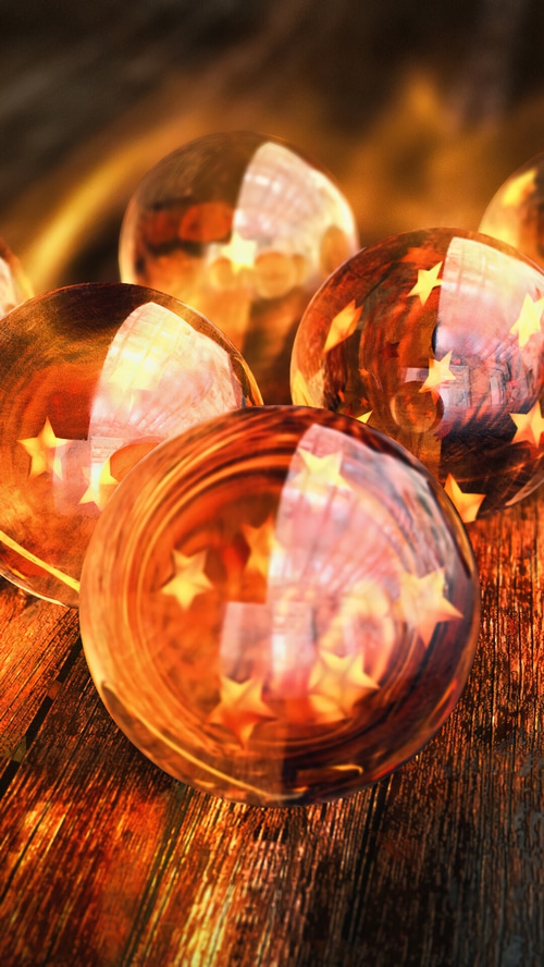 Dragon Balls with stars on wooden surface