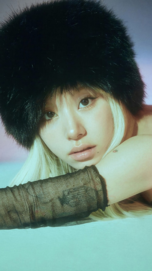 Chaeyoung from TWICE wearing a black fur hat
