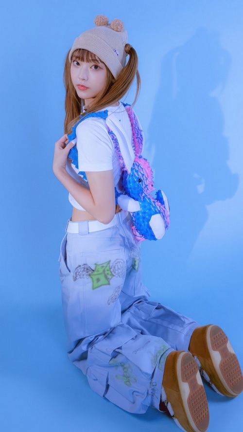NewJeans Haerin wearing a bunny backpack