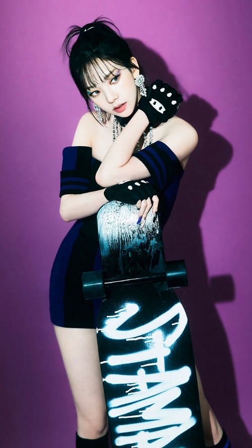 Karina from GOT The Beat with a skateboard