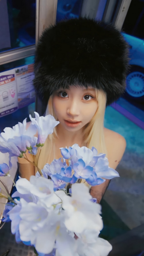 Chaeyoung of TWICE with blue and white flowers