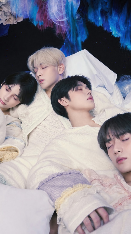 TXT members sleeping in white pajamas