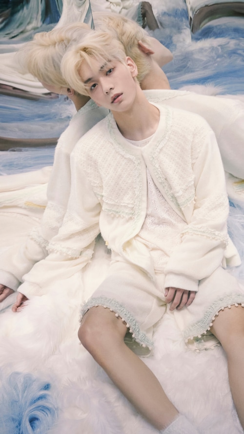 Soobin from TXT in white outfit