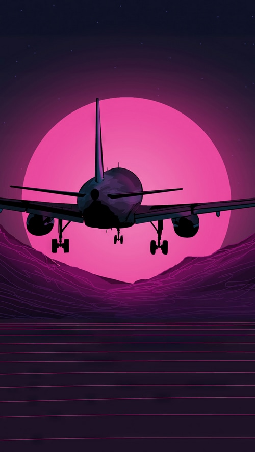 Airplane flying over neon mountains at sunset