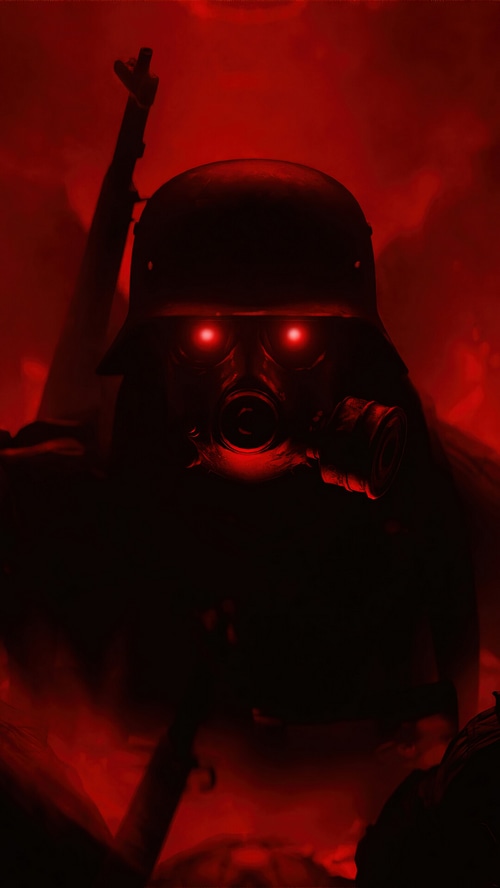 Soldier with gas mask and rifle in red light