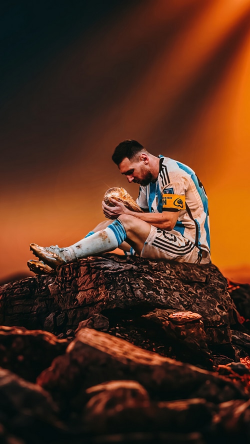 Lionel Messi holding the FIFA World Cup trophy