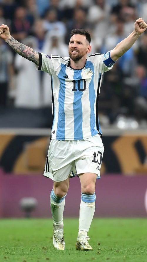 Lionel Messi celebrates scoring for Argentina