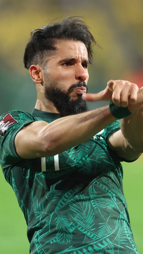 Saleh Al-Shehri celebrates during a FIFA match