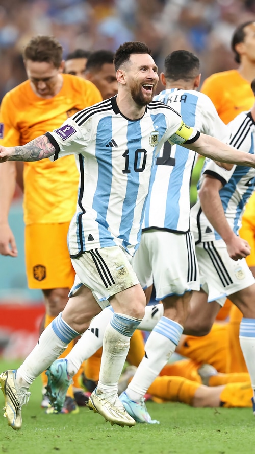 Lionel Messi celebrates scoring for Argentina
