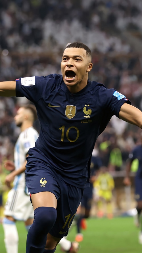 Kylian Mbappe celebrates scoring for France