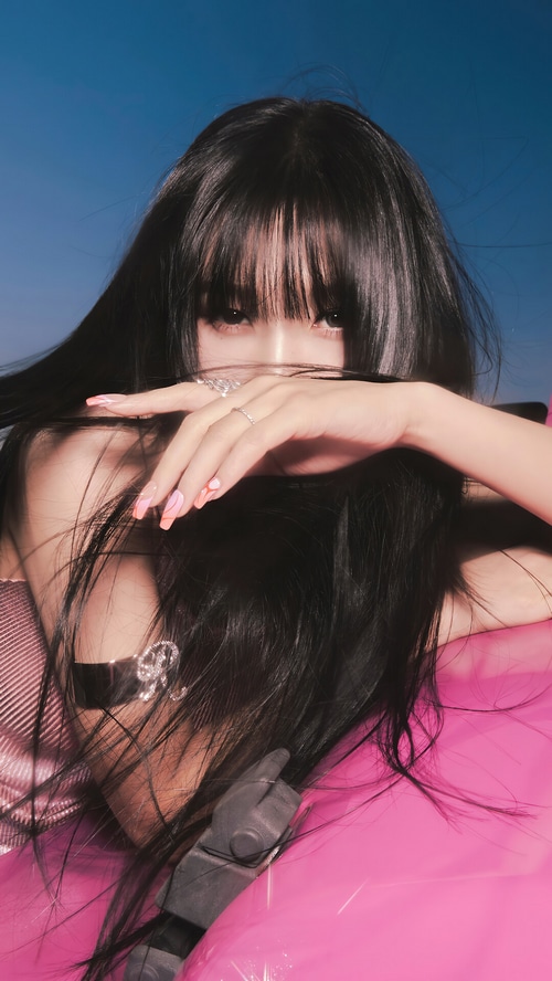 Joy from Red Velvet with long dark hair