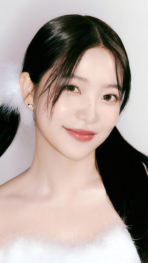 Yeri from Red Velvet with pigtails and heart earrings