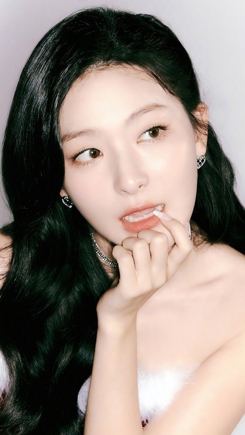 Seulgi of Red Velvet posing for a Christmas photoshoot