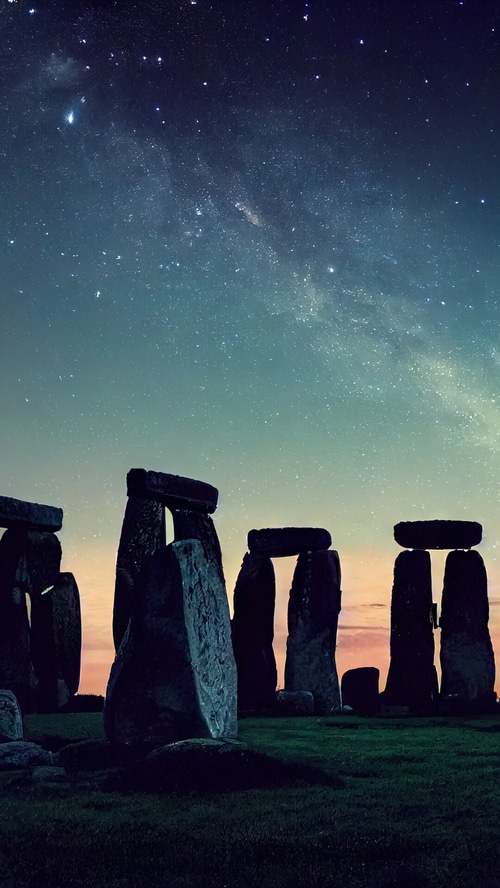 Stonehenge under a starry night sky