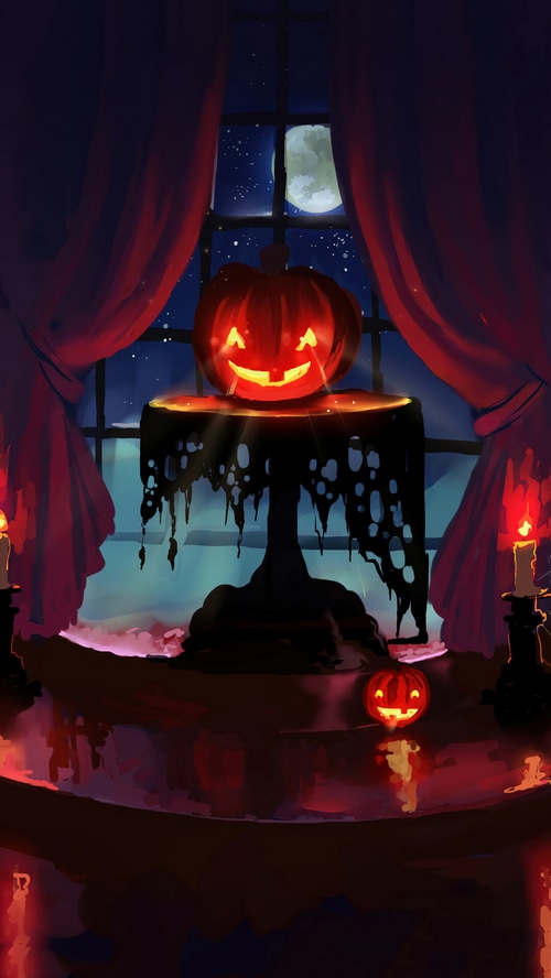 Halloween night with carved pumpkins and candles