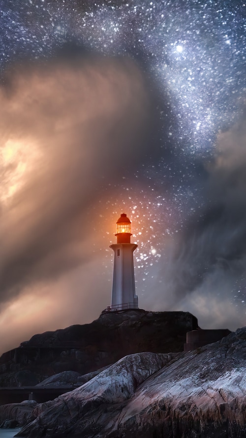 Lighthouse on a rocky shore under a starry sky