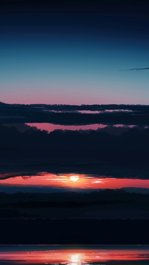 Sunset over the ocean with clouds