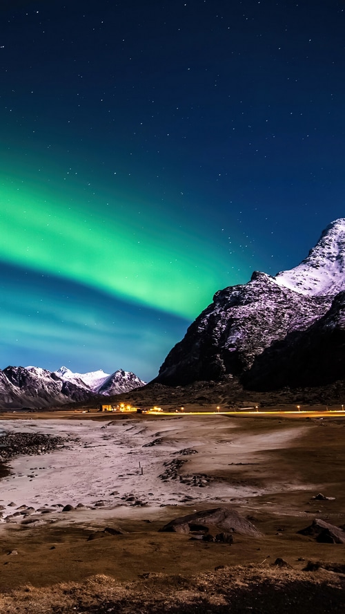 Aurora Borealis over Lofoten Mountains in Norway