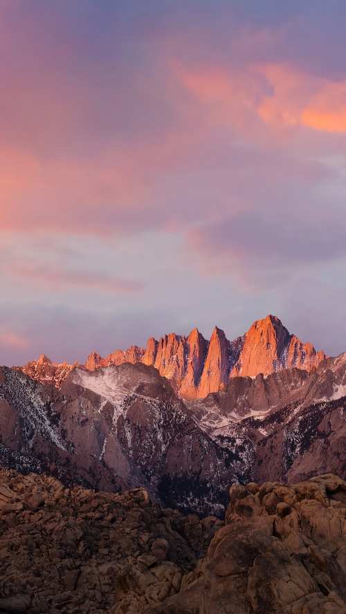 Mountain range illuminated by sunset