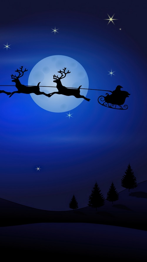 Santa Claus flying in a sleigh with reindeer
