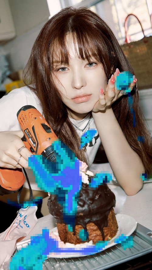Wendy from Red Velvet with a drill and cake