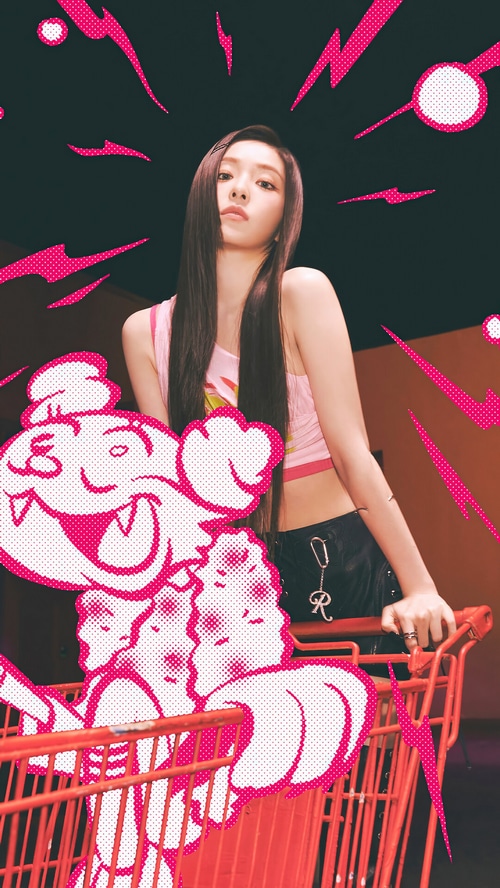 Irene of Red Velvet in a pink top and black shorts